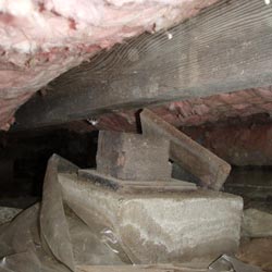 A missing crawl space support post in a Whitewater crawl space