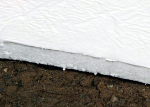 Insulation installed on a crawl space floor in Loma