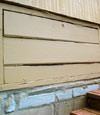 an old-fashioned crawl space door in Naturita about to be replaced