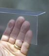 Closeup of a clear plastic covering on a Paonia crawl space block wall
