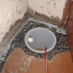 Installing a sump in a sump pump liner in a Clifton home